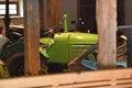 An old Steyr tractor in the open-air museum with old farmhouses and buildings in GroÃÅ¸gmain in Salzburg, Austria, Europe